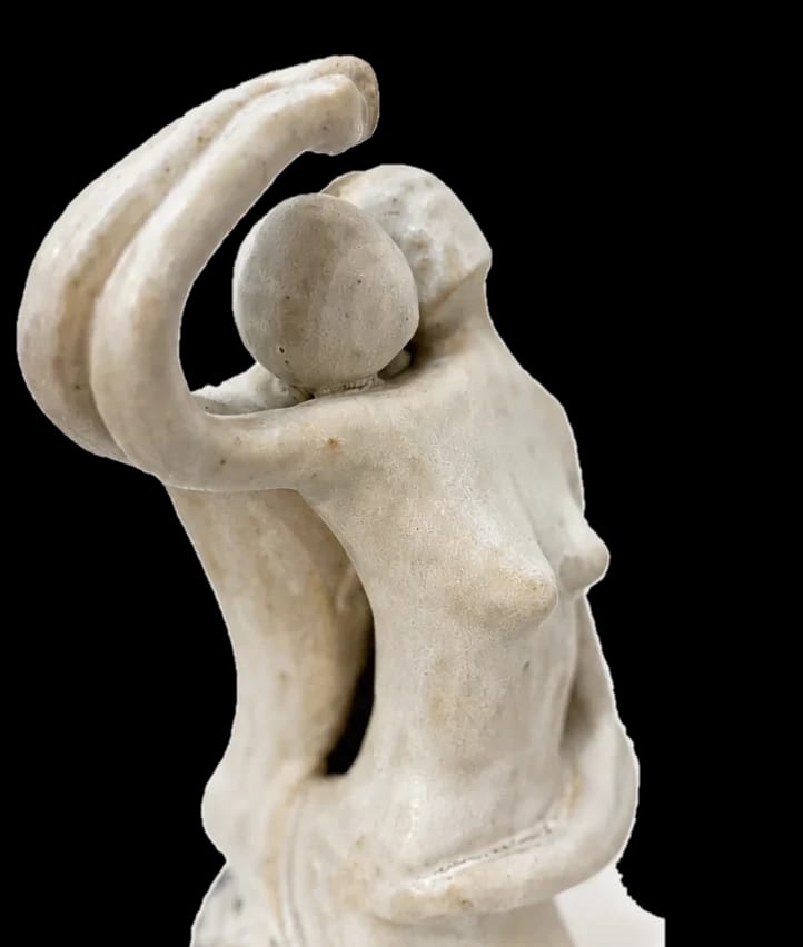 A ceramic figure with one arm raised and curved overhead, a second figure resting against it